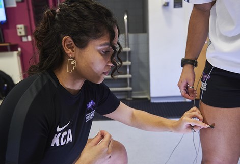 student being fitted with a sensor