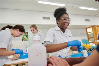 Student nurse laughing