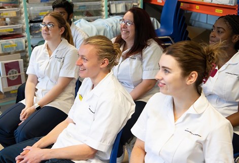 students sitting in chairs