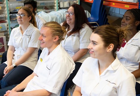 students sitting in chairs