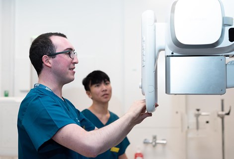 students using equipment in the radiography suite