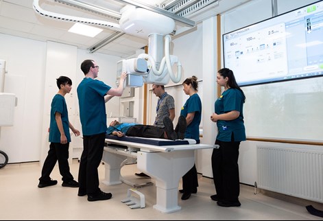 students using the xray table