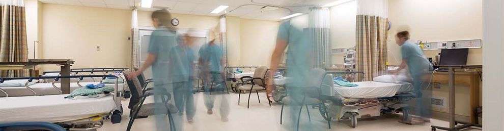 blurred image of staff on a hospital ward