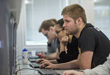 Students working in the newsroom