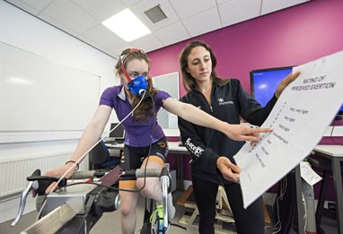 Student on sports science testing cycle