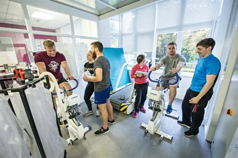 Brighton Uni strength and conditioning students researching using gym equipment