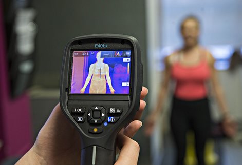 students using equipment in the labs