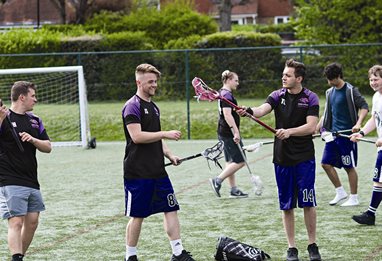 Students playing lacrosse