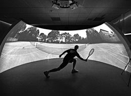 Sport science student testing tennis VR