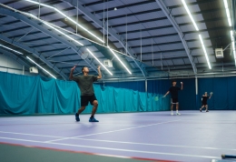 Badminton player about to strike