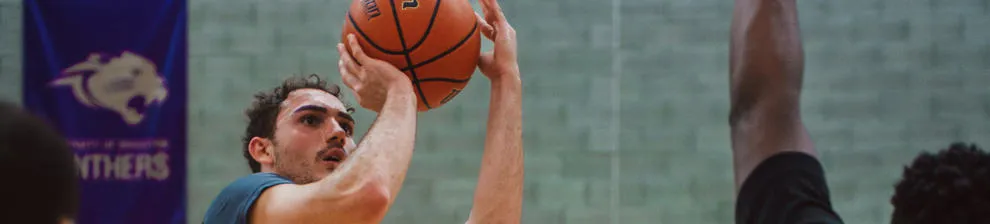 Student playing basket ball