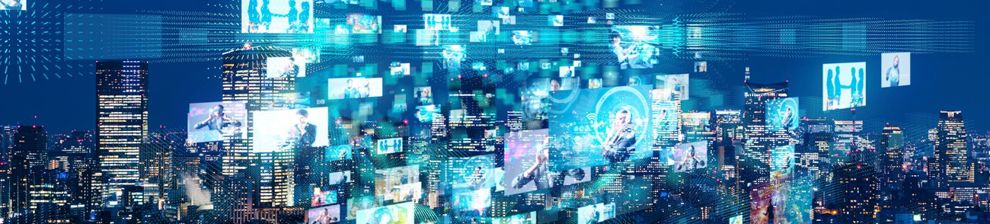 Graphic illustrating media with skyscraper cityscape and multiple screens.