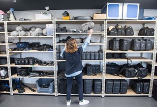 Student in front of media equipment