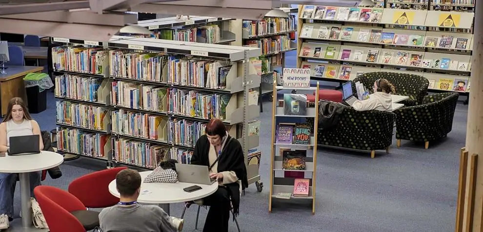 student using the library