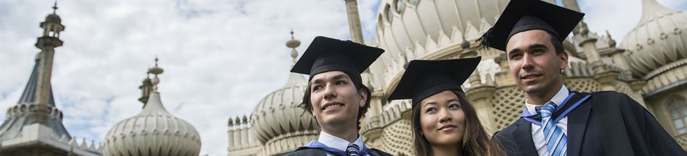 3 graduates by the Royal Pavilion