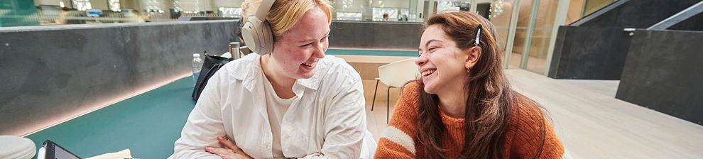 Students working in a group workspace in Elm House