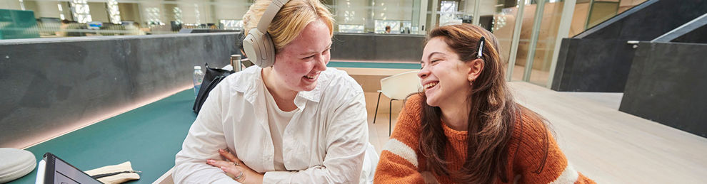 Students working in a group workspace in Elm House