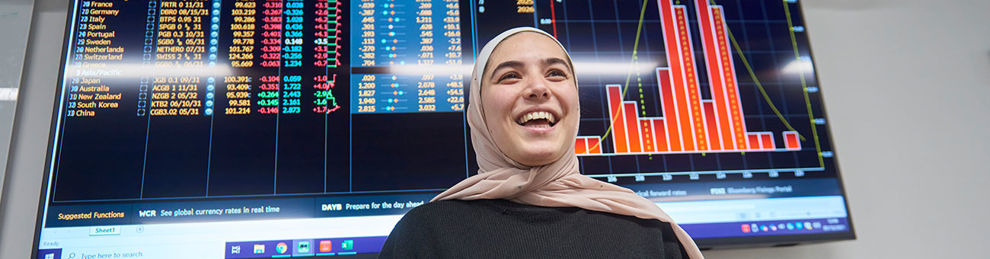 Student in front of Bloomberg data