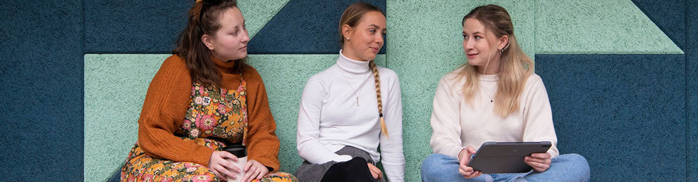 Group of students sitting in Elm House together