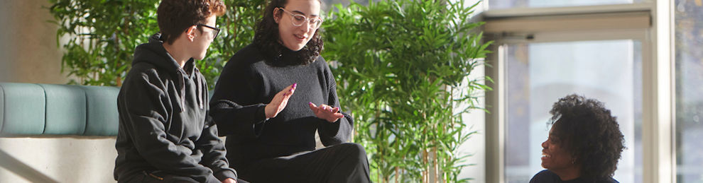 Students chatting in Elm House atrium