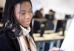 Close up of a student looking at her computer