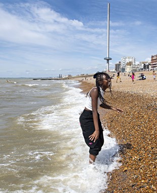 Student on Brighton beach