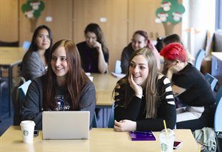 Group of students working in a classroom