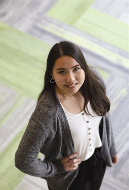 Student Anya Wangsuwan posing in university building