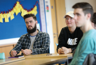 Group of Study Abroad students working in a class