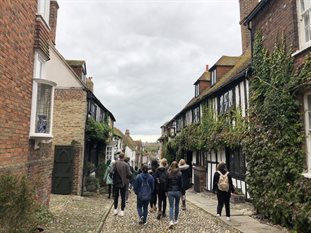 A group of students walking the cobbled streets of Rye