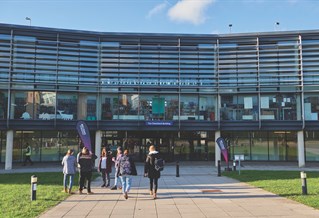Outside the Falmer Campus Checkland building