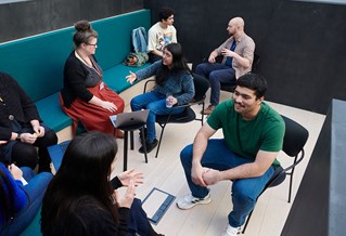 Student Support team chatting with international students
