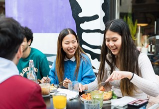 Kaplan Students in Brighton enjoying a meal together