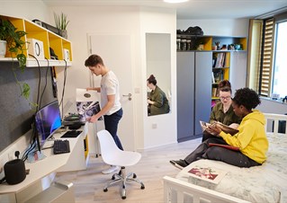 A group of students inside Mithras halls of residence