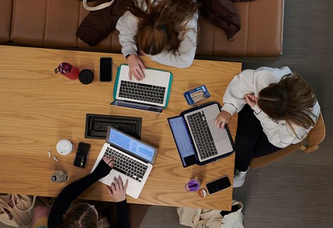 students studying around a table