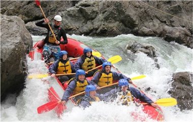 A group white-water rafting