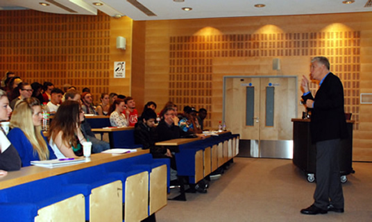 Nicholas Owen talking to students in Hastings.