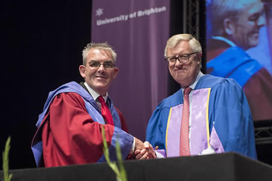 Dr Gary Stidder (left) with Chairman of the Board of Governors Lord Mogg