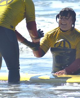 Lexi Hibberd surfing