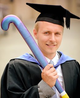 Ewan Mackrill with his hockey stick