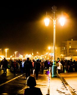 Crowds watching the burning of the clocks