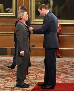Professor Julian Crampton receiving his CBE from HRH Prince William
