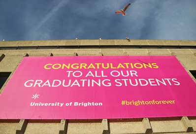 Banner saying 'Congratulations' on the Brighton Centre