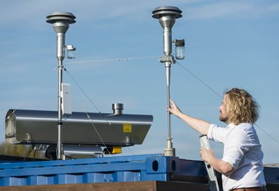 Dr Kevin Wyche at the air quality monitoring station at Falmer