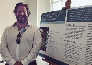 Mark Doidge in front of his British Academy poster