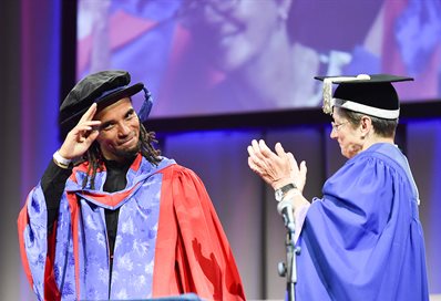 Akala with Vice-Chancellor Debra Humphris