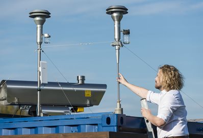 Dr Kevin Wyche at the air quality monitoring station at Falmer