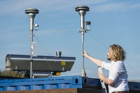 Dr Kevin Wyche at an air monitoring station at Falmer