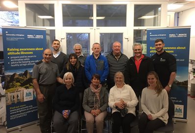 Dr Neil Maxwell with colleagues and the Suchet family