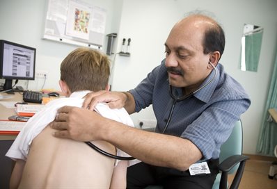 Professor Somnath Mukhopadhyay with patient